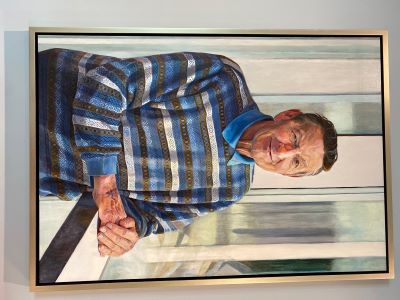 Portrait of a man, Walter Gretzky, standing with his hands folded and resting on a ledge, facing the painter.