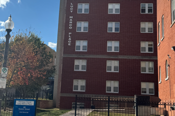 Lucy Marco Place Lucy Marco Place affordable housing, six story red brick building